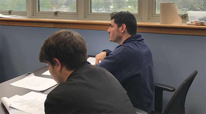 爱豆传媒app Students Sitting in a Class Taking Notes